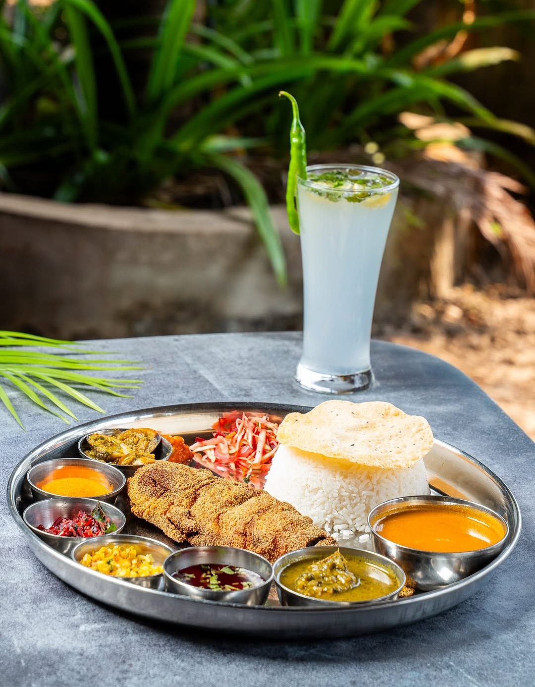 Fish thali with green chilli cooler