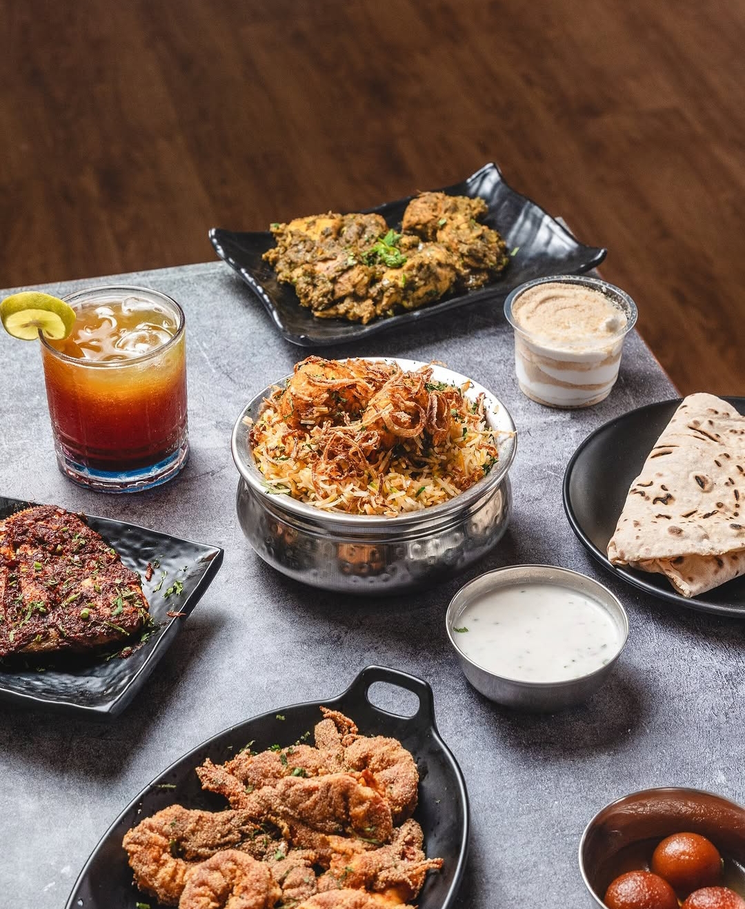 Prawn biryani feast with kebabs and rotis