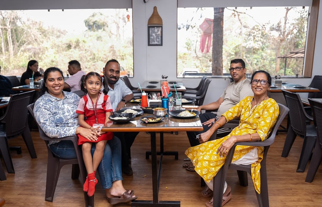 Families dining together at Smita's